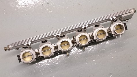 SP6 THROTTLE SPINDLE BUSHING